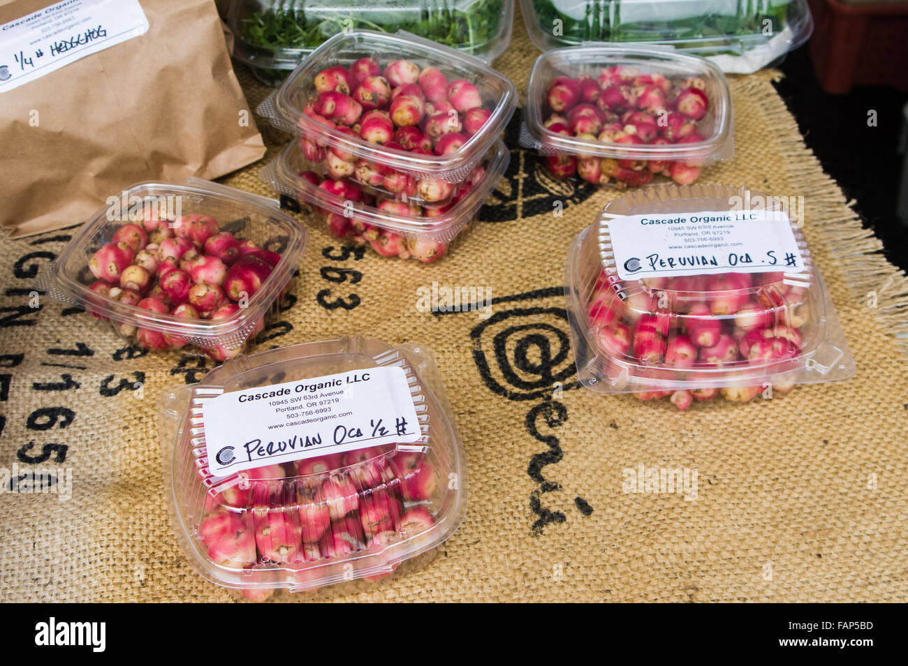Packages of Peruvian Oca tubers on display for sale at a market stall in Beaverton, Oregon, USA Stock Photo