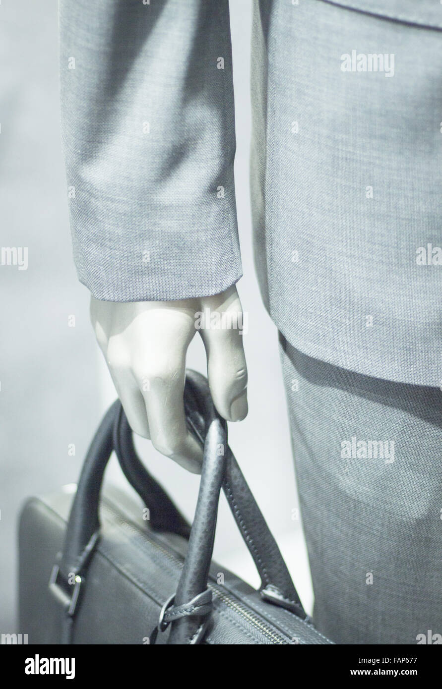 Store mannequin carrying luxury leather briefcase photo Stock Photo Alamy