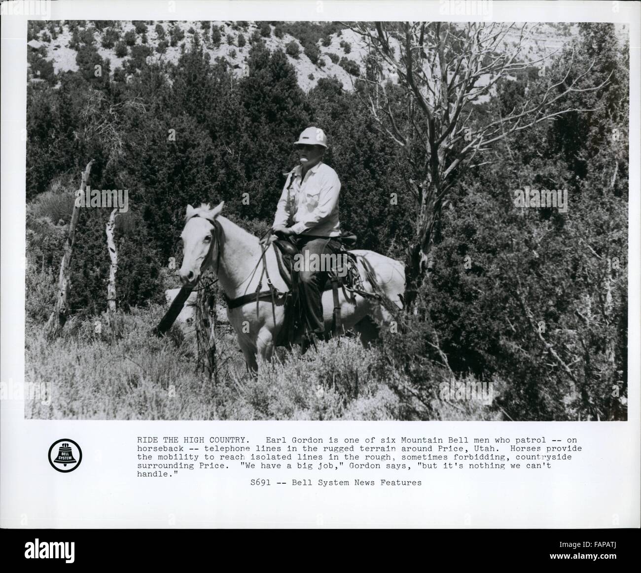 1962 - Ride the High Country Earl Gordon is one of six Mountain Bell men who patrol on horseback, telephone lines in the rugged terrain around Price, Utah. Horses provide the mobility to reach isolated lines in the rough, sometimes forbidding, countryside surrounding Price. We have a big job, Gordon says, but it s nothing we can t handle. © Keystone Pictures USA/ZUMAPRESS.com/Alamy Live News Stock Photo