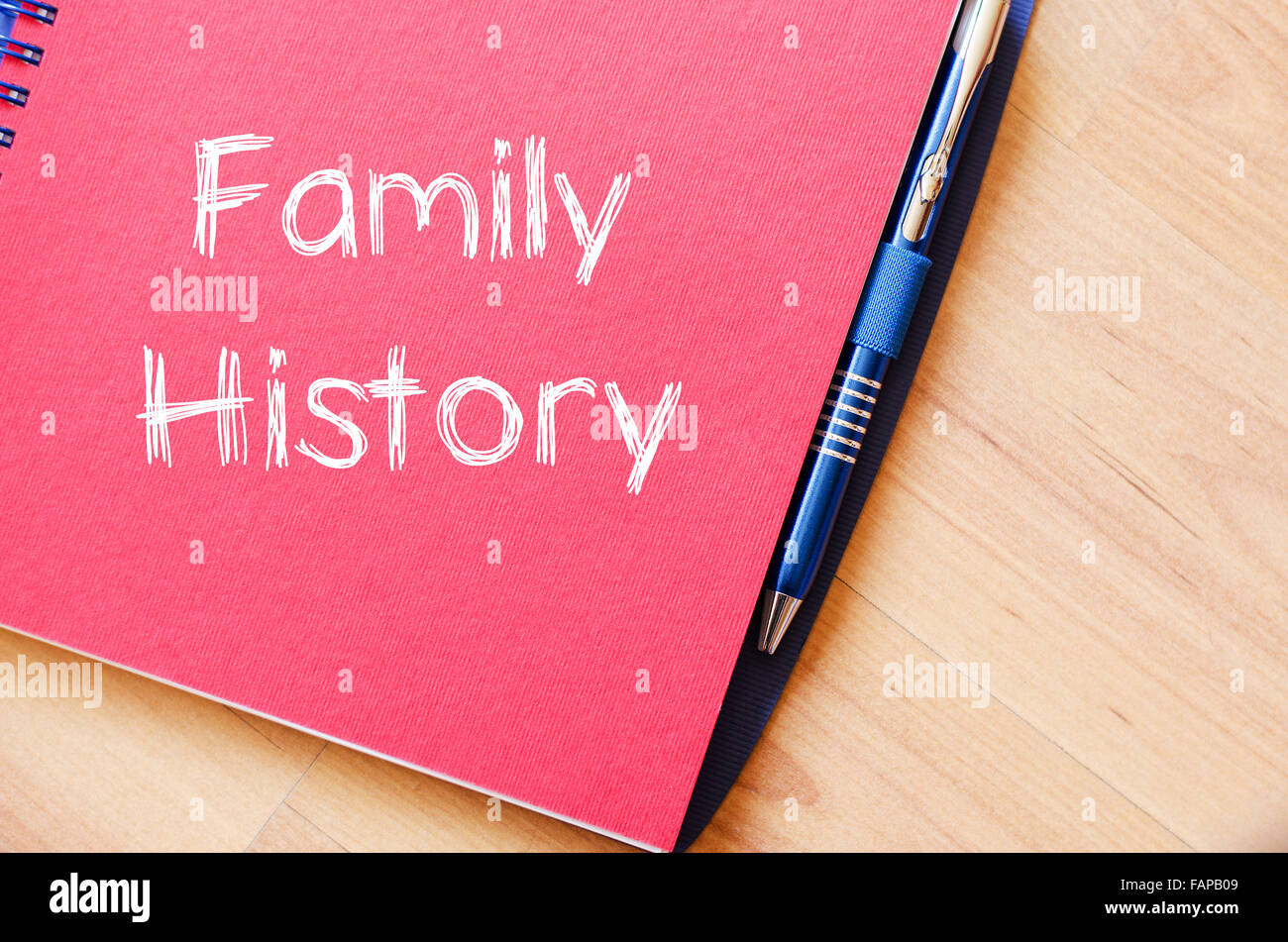 Family history text concept write on notebook with pen Stock Photo