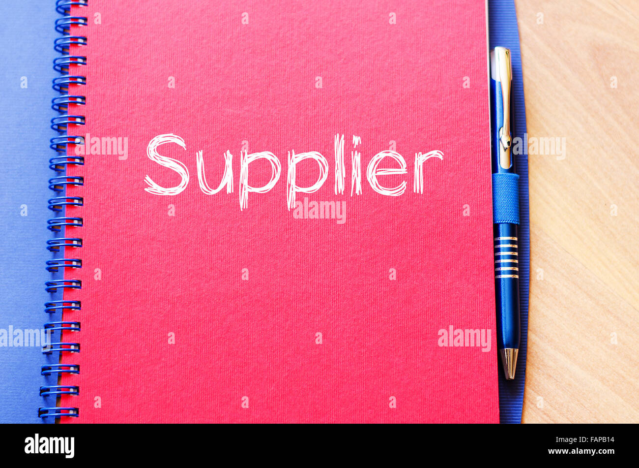 Supplier text concept write on notebook with pen Stock Photo Alamy
