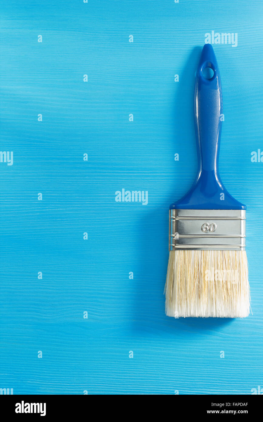 paint brush on wooden background Stock Photo - Alamy
