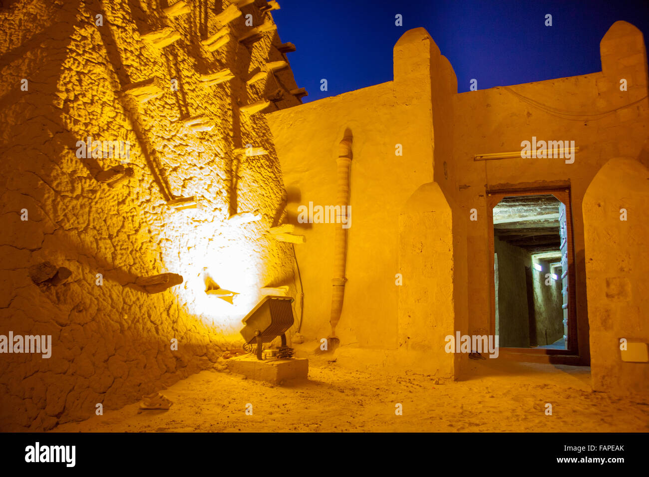 The main Timbuktu mosque lit up by night Stock Photo