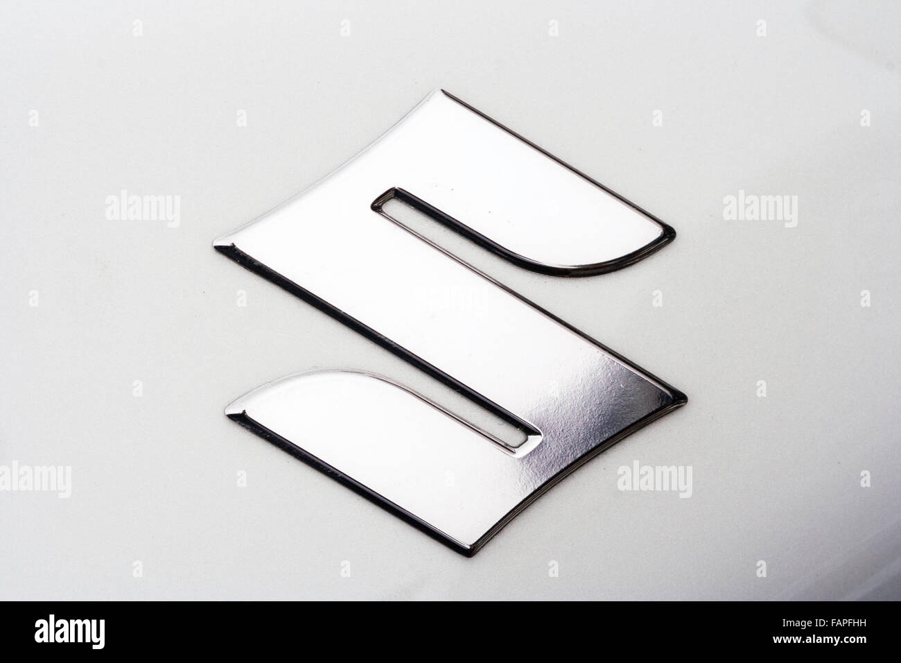 S, silver coloured Logo of Suzuki motor-bike company on metal silver  background Stock Photo - Alamy
