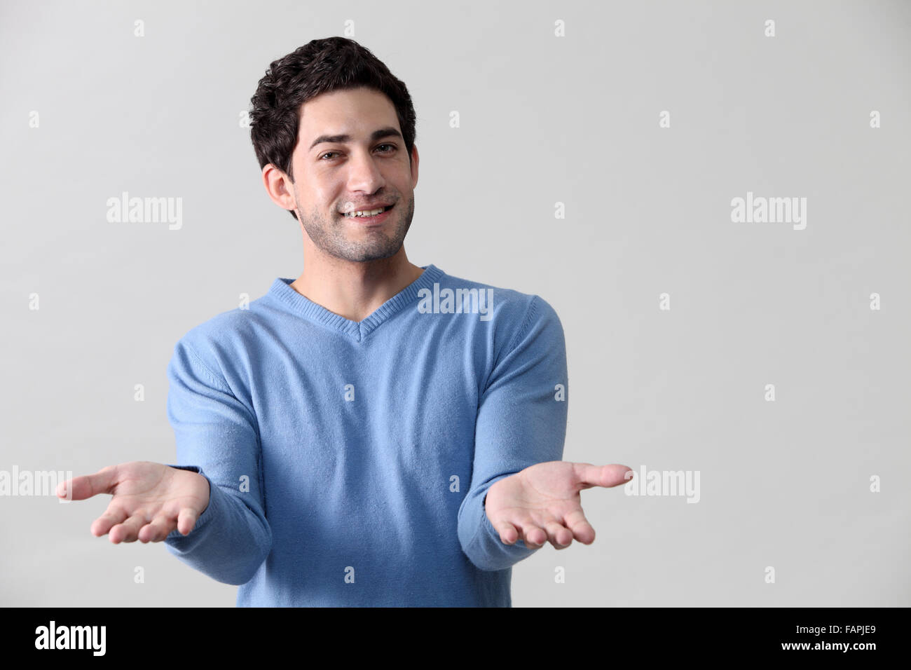 Man giving a helping hand Stock Photo - Alamy
