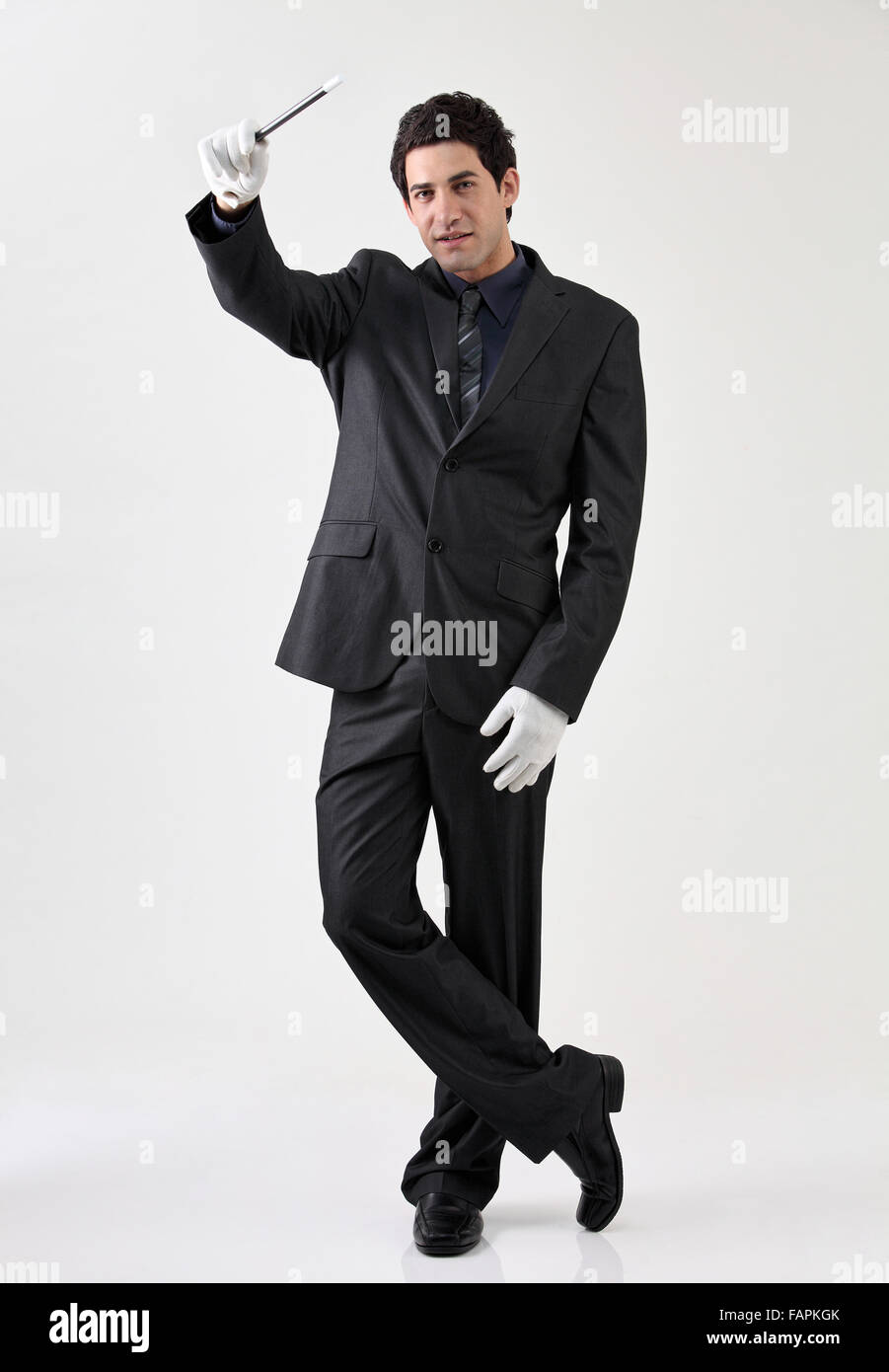 Businessman dressed as magician Stock Photo - Alamy