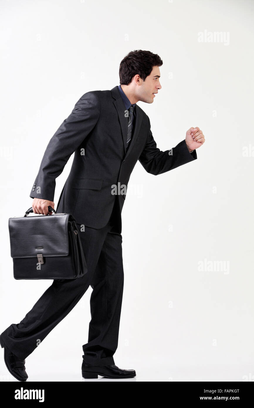 Businessman running with briefcase Stock Photo Alamy