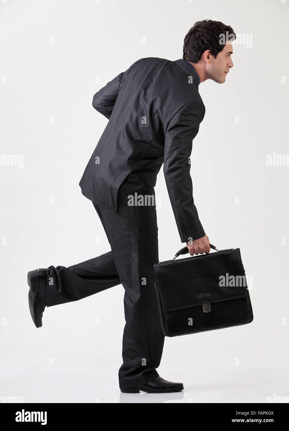 Businessman running with briefcase Stock Photo Alamy