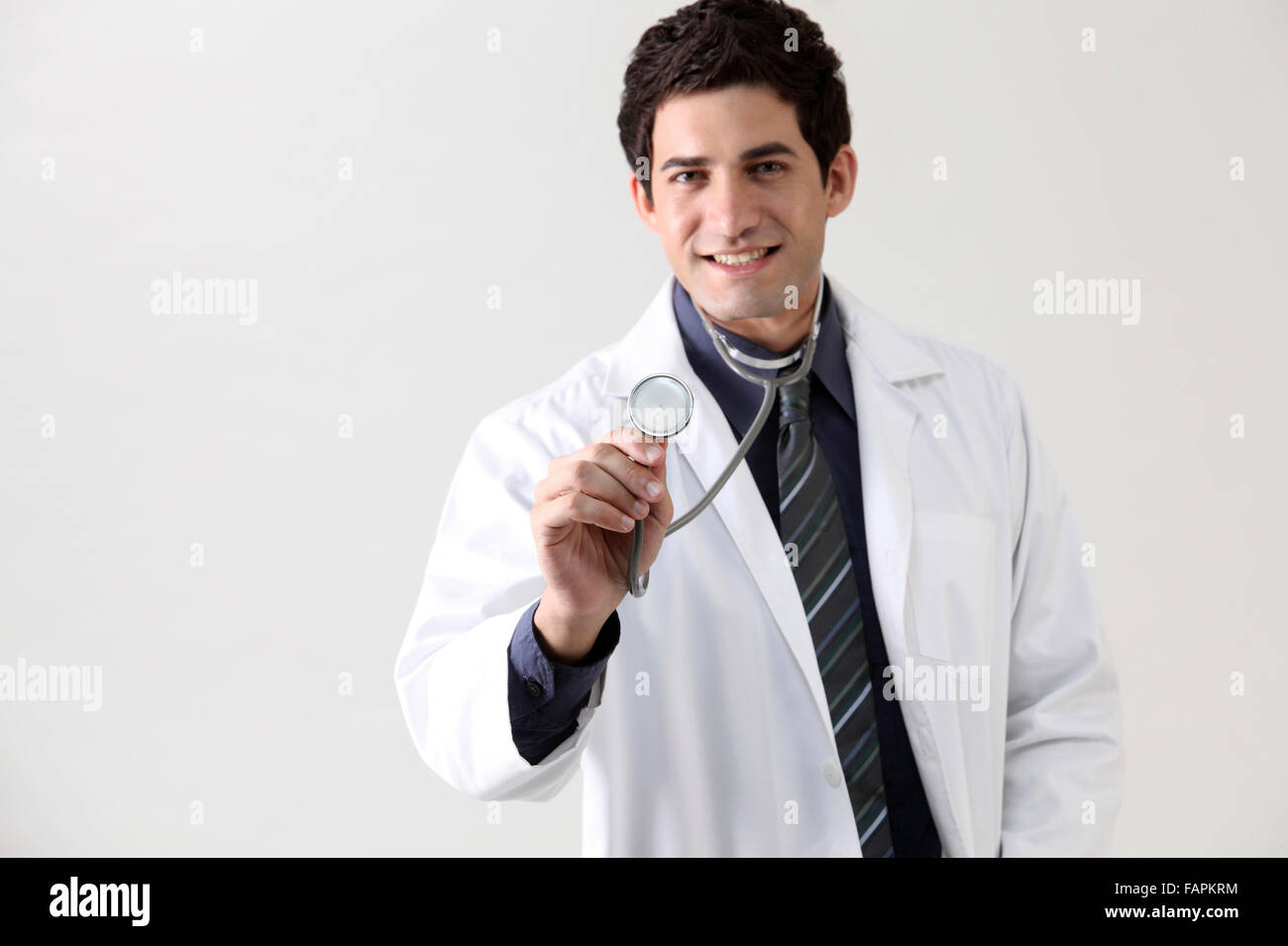 Confident doctor portrait in white background Stock Photo - Alamy