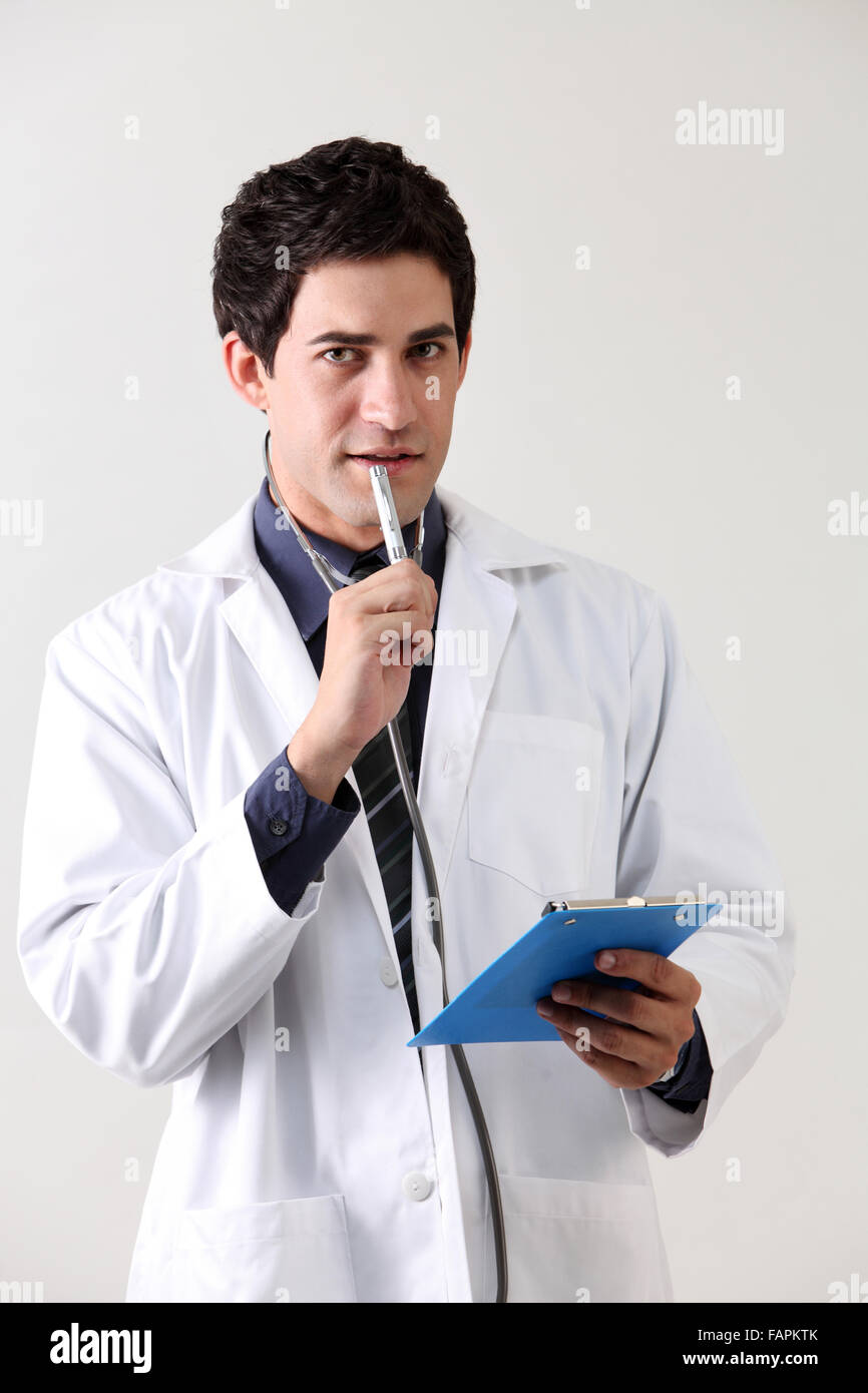 Confident doctor portrait in white background Stock Photo - Alamy