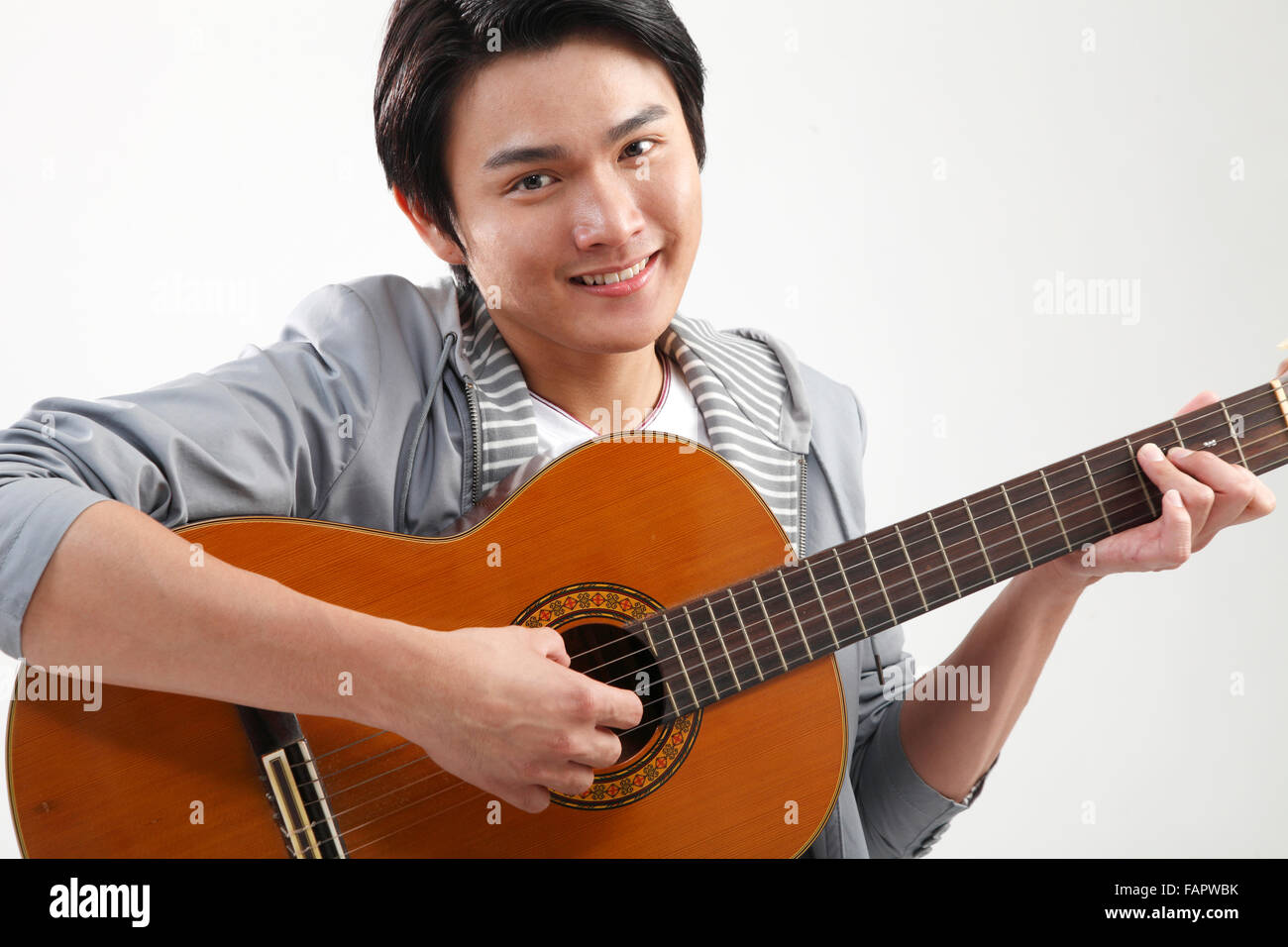 Half man playing guitar hi-res stock photography and images - Alamy