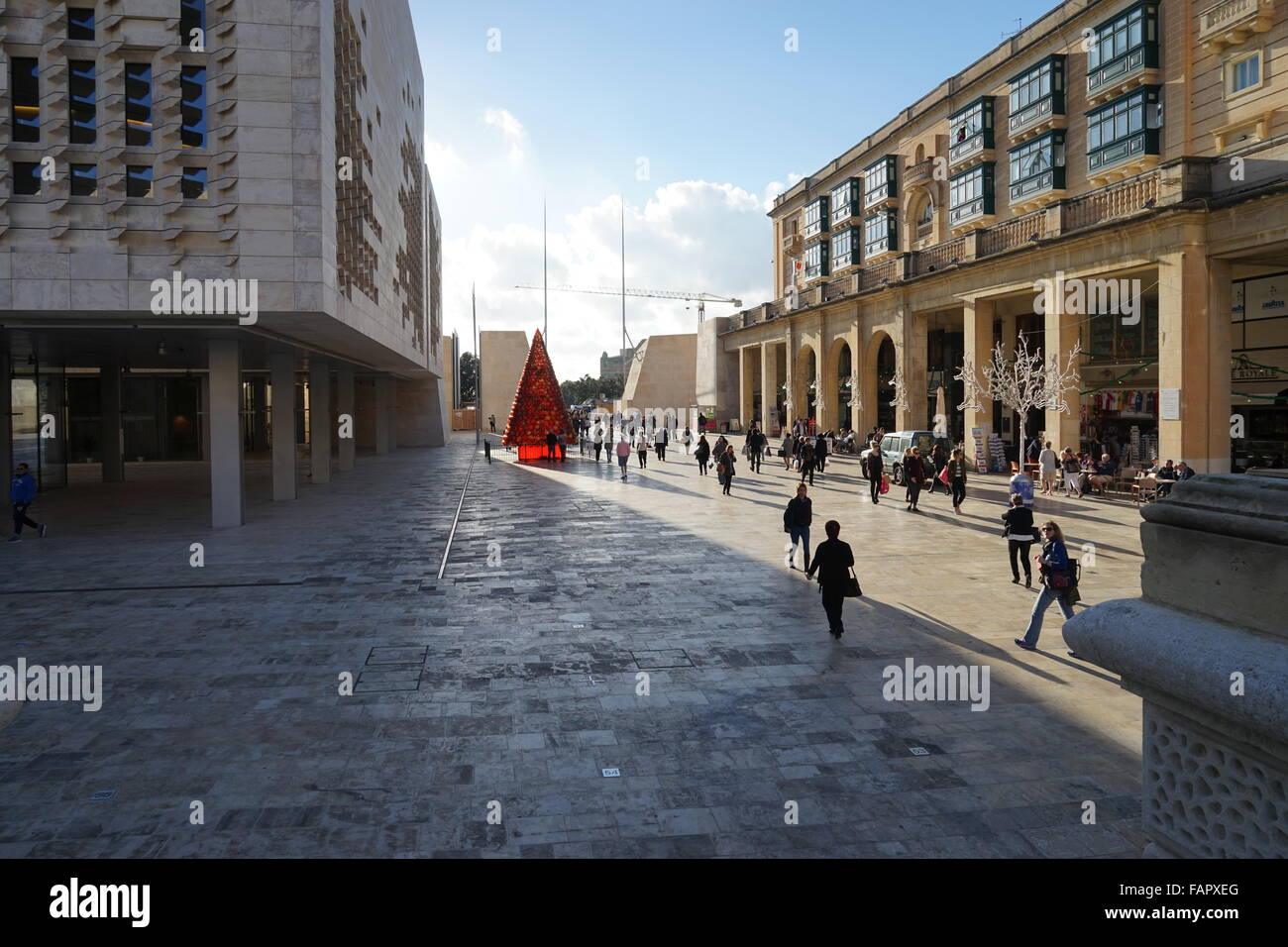 Malta, Valletta Capital High Street people walking to Bus Station Stock Photo