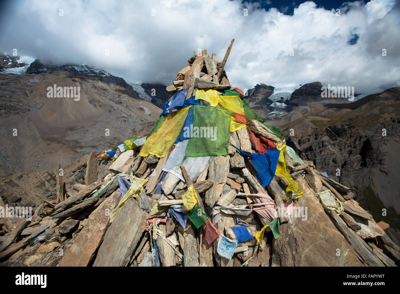 Prayer Flags and Stones in Thorong High Camp (4900 m) Stock Photo