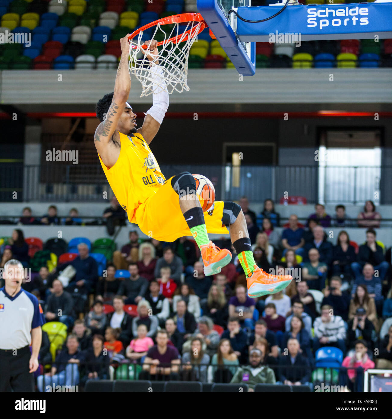 London, UK. 3rd January 2016. London Lions' Nick Lewis (11) outruns the Plymouth defense and dunks the ball during the London Lions vs. Plymouth Raiders BBL game at the Copper Box Arena in the Olympic Park. London Lions win 86-84 Credit:  Imageplotter/Alamy Live News Stock Photo