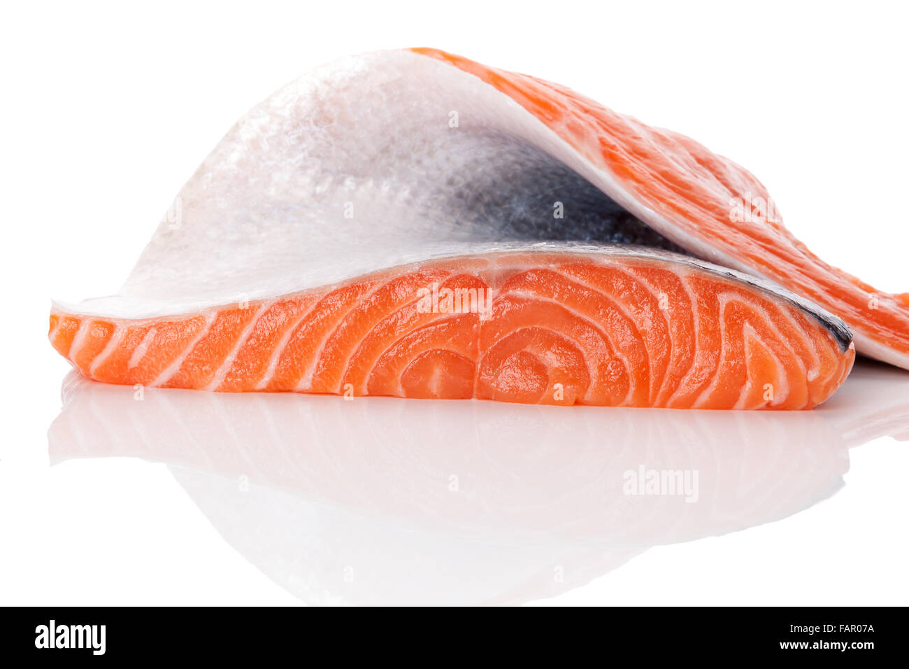 Big fresh raw salmon piece isolated on white background. Luxurious ...