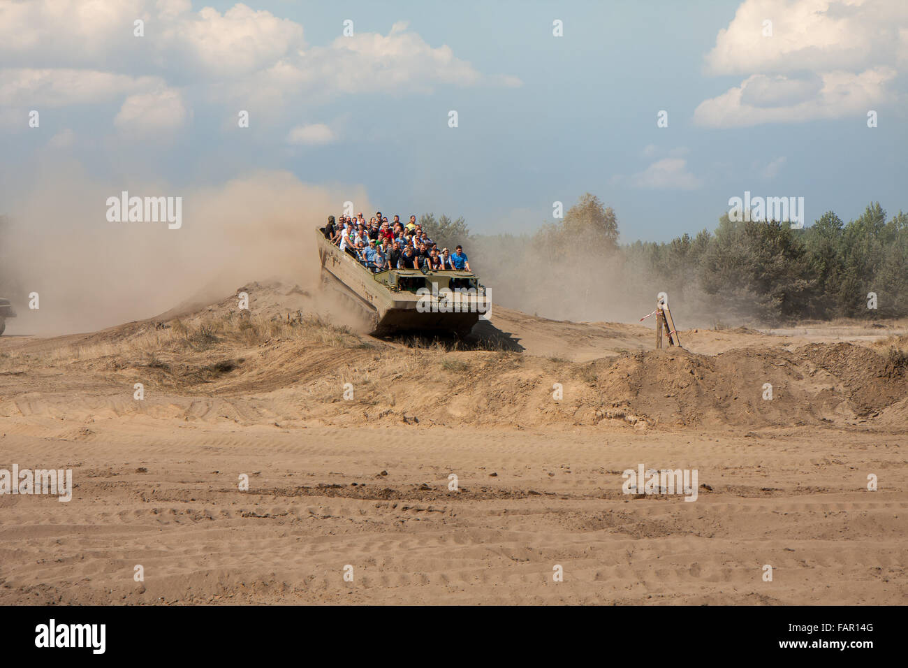 Borne Sulinowo, Poland - August 23, 2015:  Military armoured vehicle takes tourists around the training ground Stock Photo