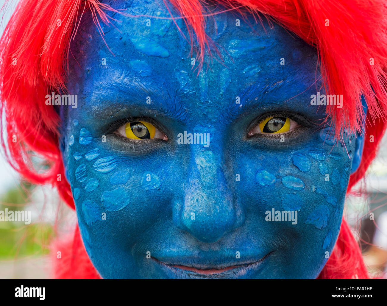 Teenage girl made up to like Mystique the Xmen comic character Stock Photo