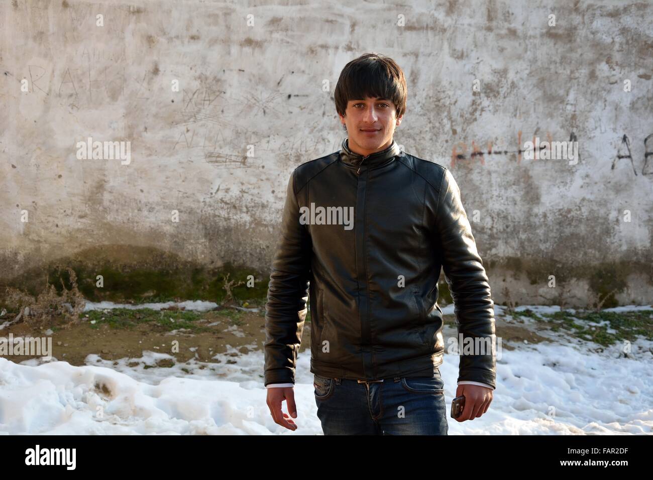 LOKBATAN, AZERBAIJAN - FEBRUARY 8 2014 A handsome young local man is