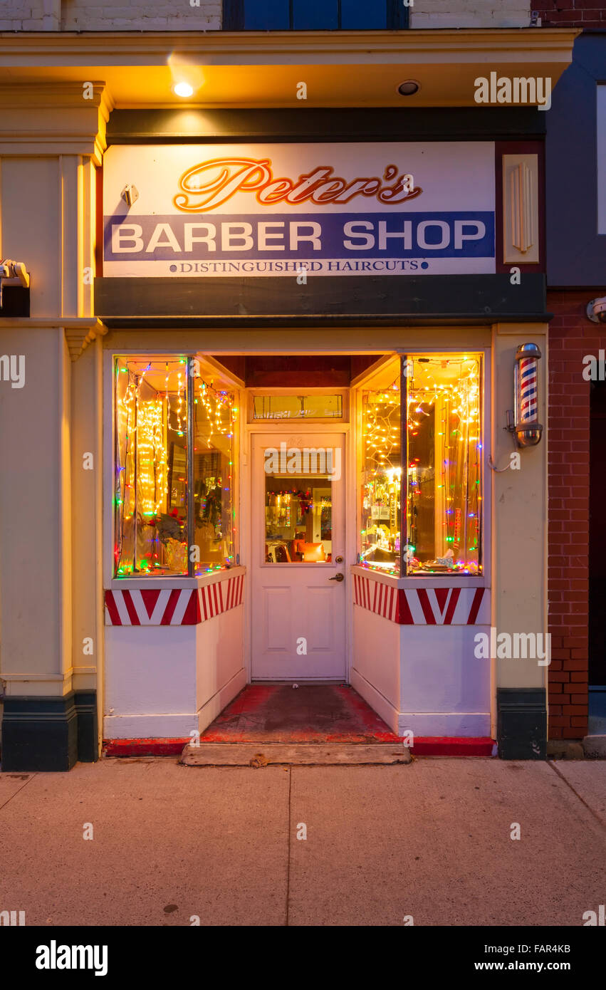 Peter's Barber Shop at dusk in downtown Cobourg, Ontario, Canada. Stock Photo