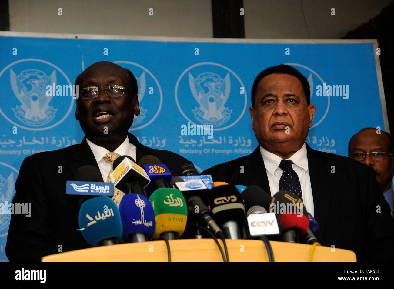 Khartoum, Sudan. 3rd Jan, 2016. South Sudanese counterpart Barnaba Benjamin (L) speaks while Sudan's Foreign Minister Ibrahim Ghandour looks on during a press conference held after their talks in Khartoum, Sudan, Jan. 3, 2016. Sudan and South Sudan reiterated Sunday their joint commitment to their cooperation agreements. Credit:  Mohammed Babiker/Xinhua/Alamy Live News Stock Photo