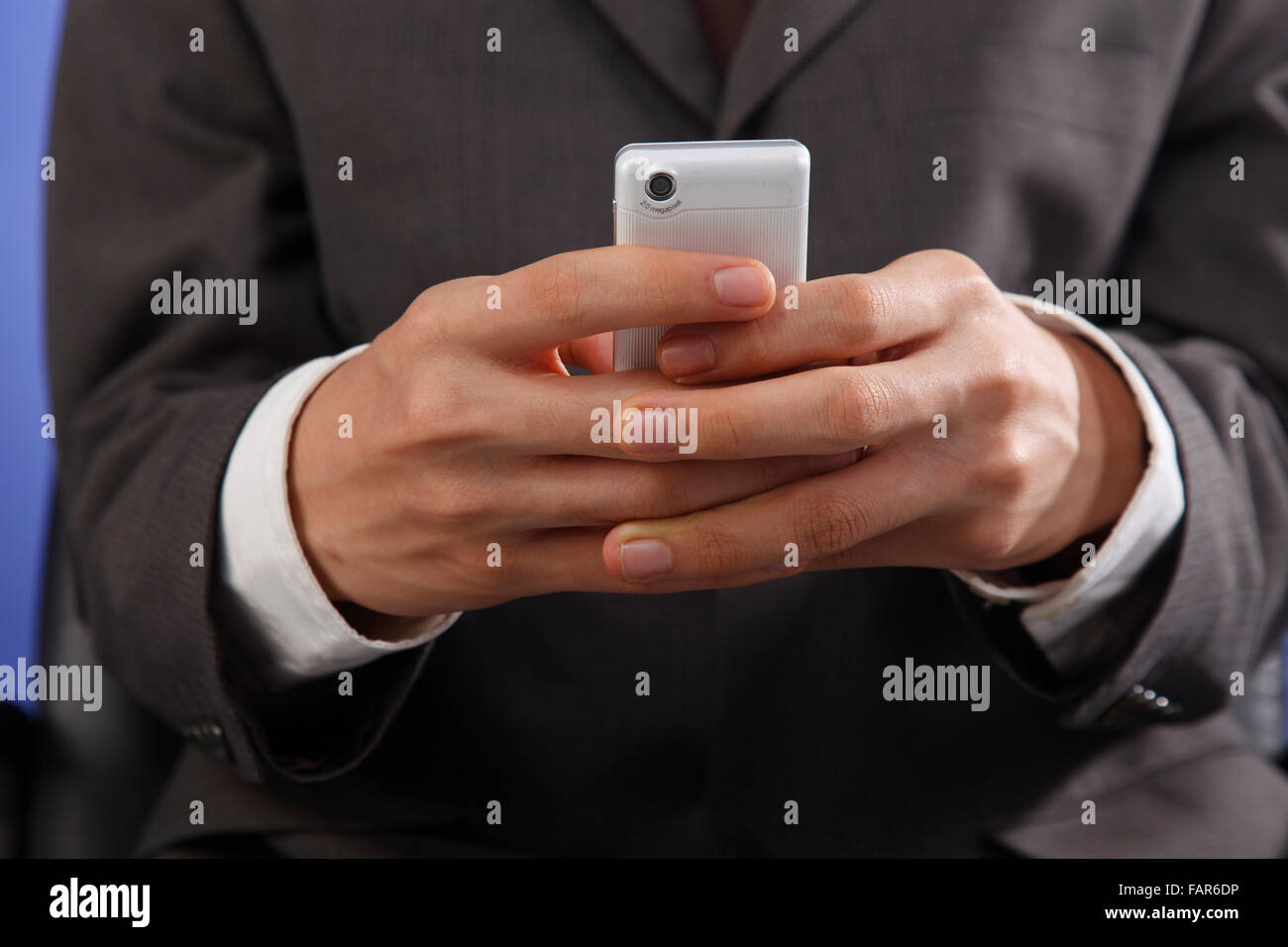 stock image man using mobile phone Stock Photo - Alamy