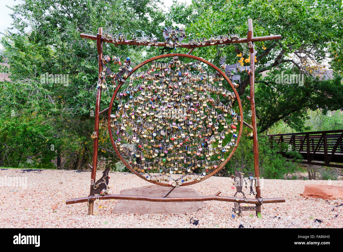 Love locks attached to a metallic structure at the entrance of Zion National park, Utah, USA. Stock Photo
