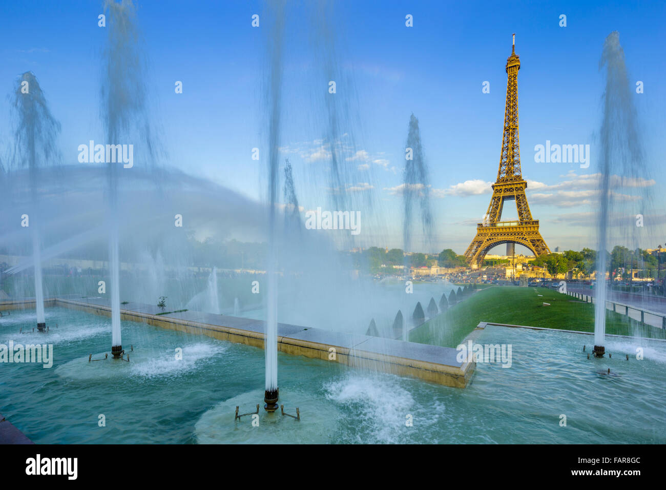 Eiffel Tower in evening seen from fountains in Trocadéro Gardens, Paris Stock Photo