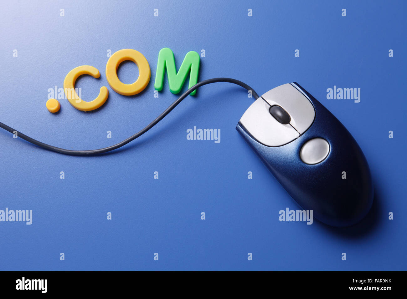 Computer Mouse Letter Format Mouse with magnetic letters isolated on the blue background Stock Photo ...
