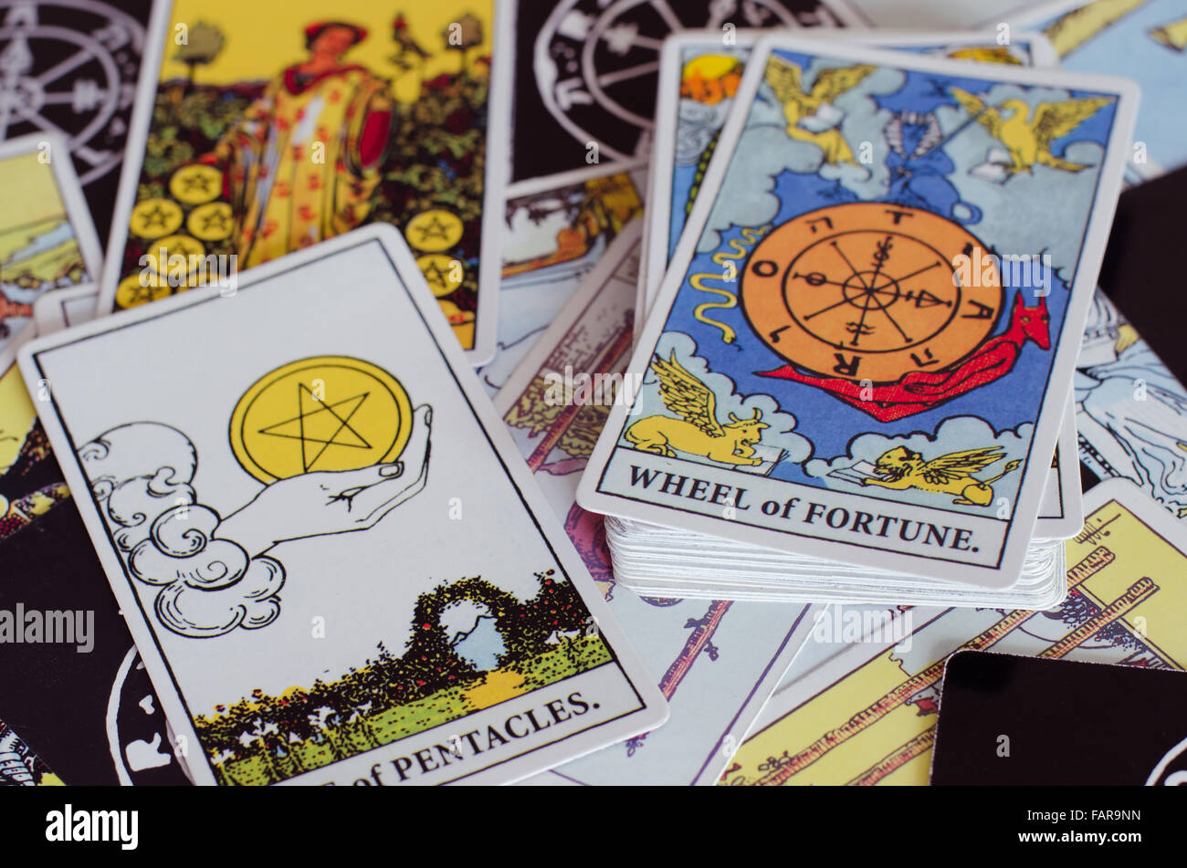 Tarot Cards - Ace of Pentacles and Wheel of Fortune Card. Stock Photo