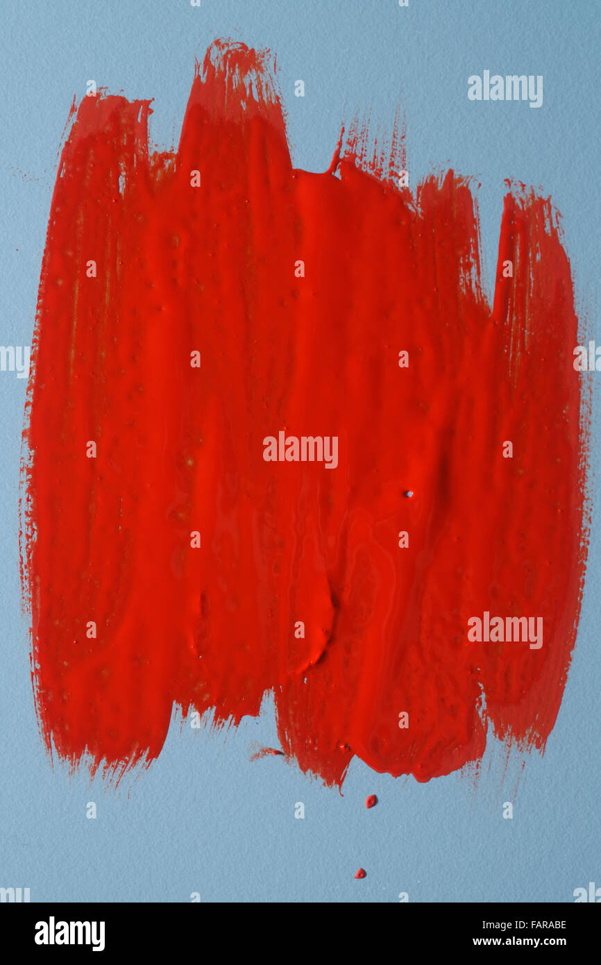 Paint brush strokes isolated on the blue background Stock Photo - Alamy