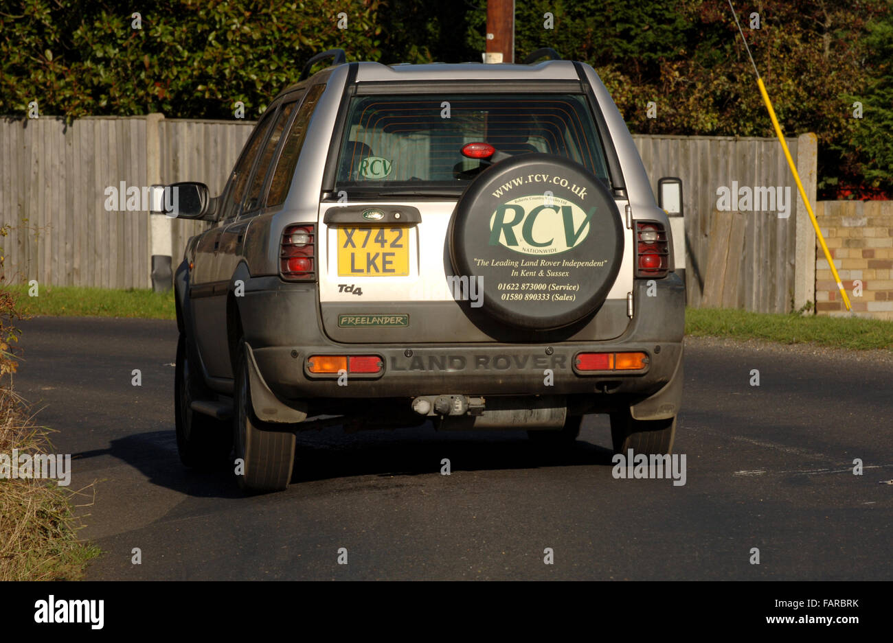 2000 Land Rover Freelander 4x4 car driving around a corner in the country Stock Photo
