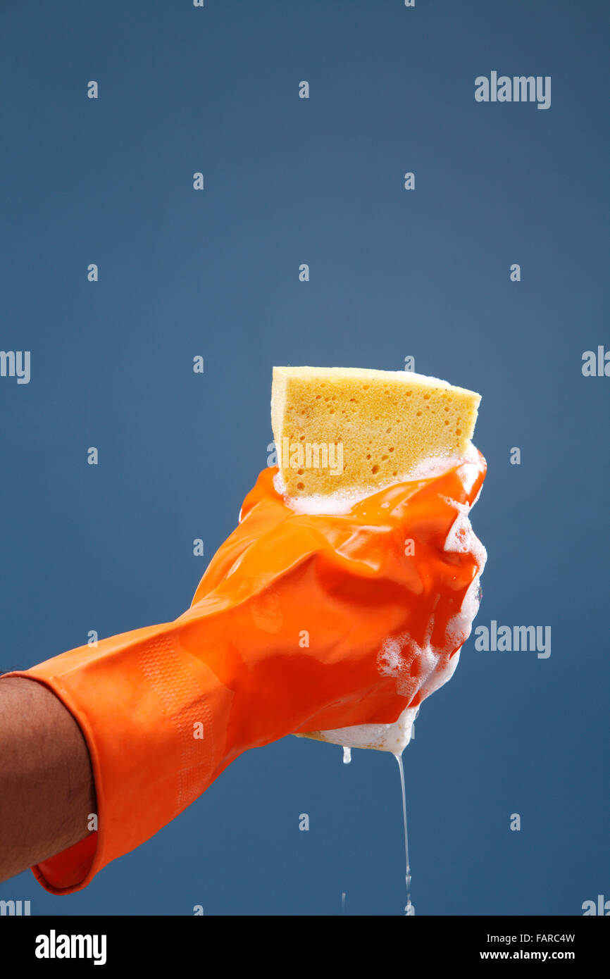 Squeezing sponge hi-res stock photography and images - Alamy