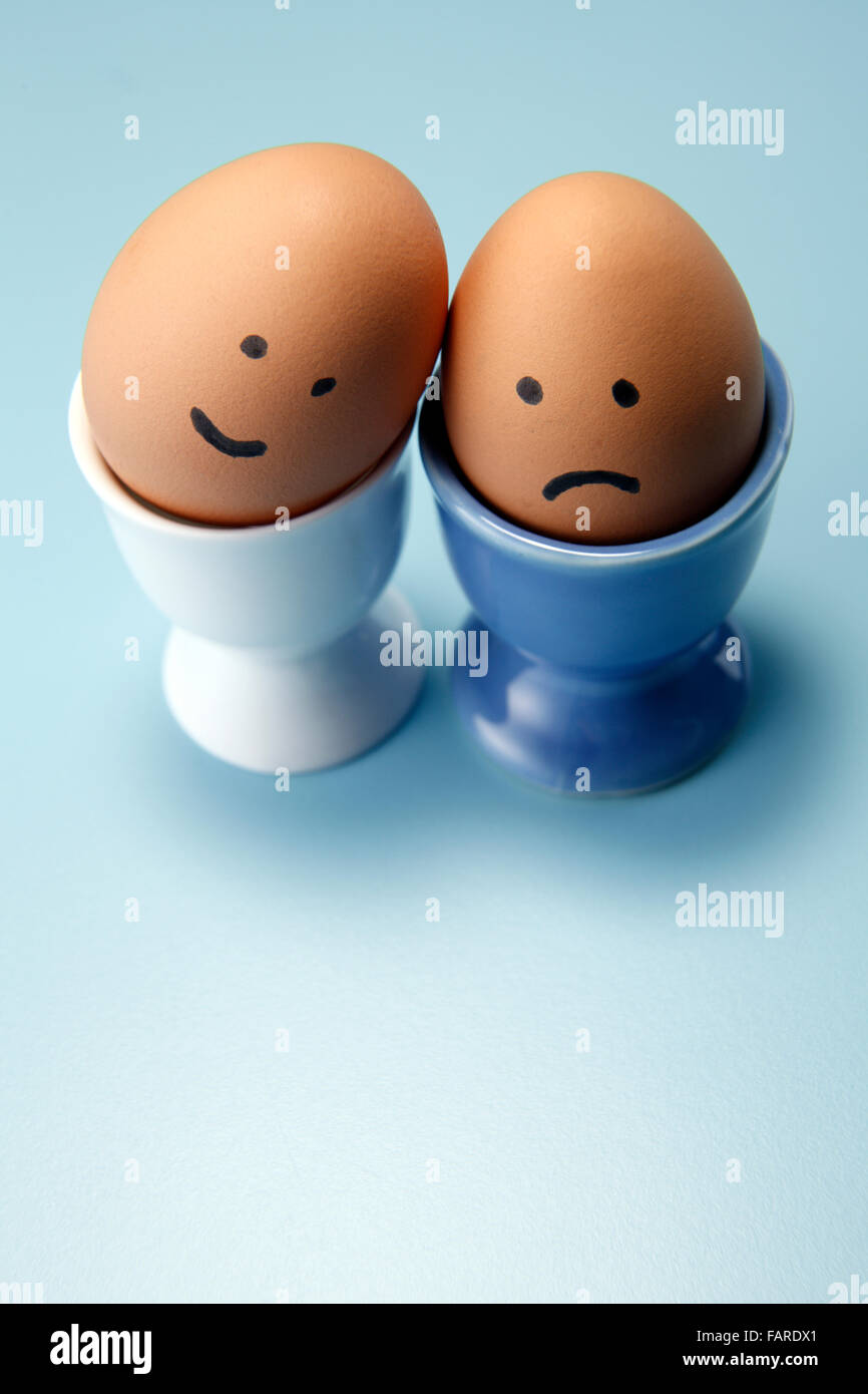 egg with funny face on the egg cup Stock Photo