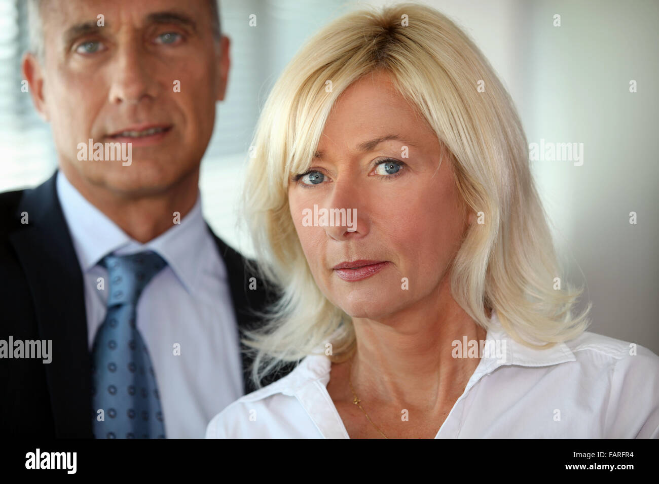 Posing with her boss Stock Photo