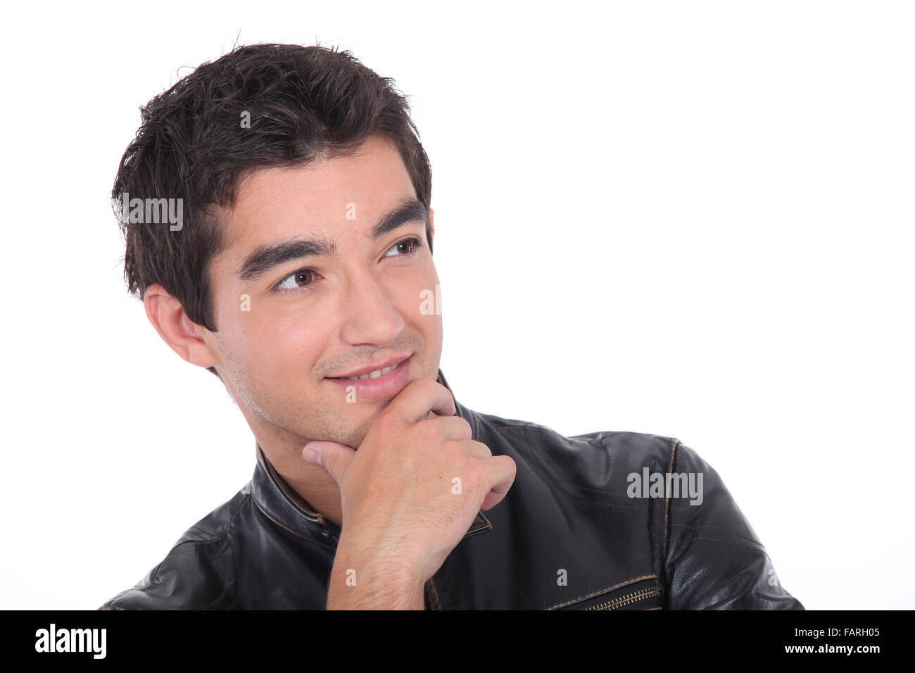 Pensive young man Stock Photo - Alamy
