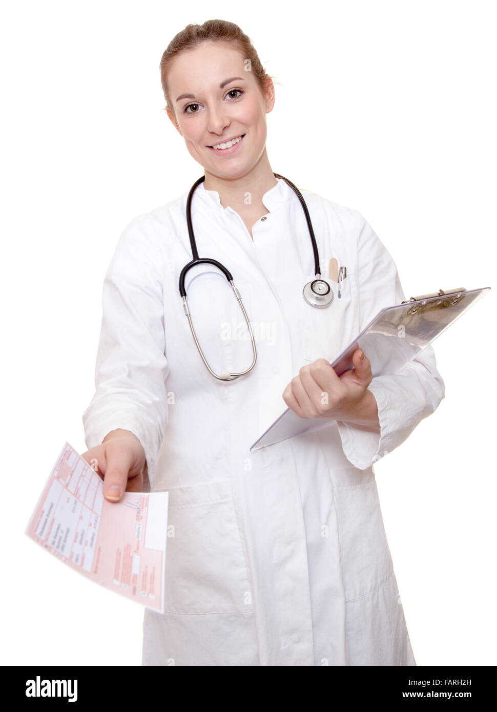 Attractive female physician hands out german prescription with fake data. All on white background. Stock Photo