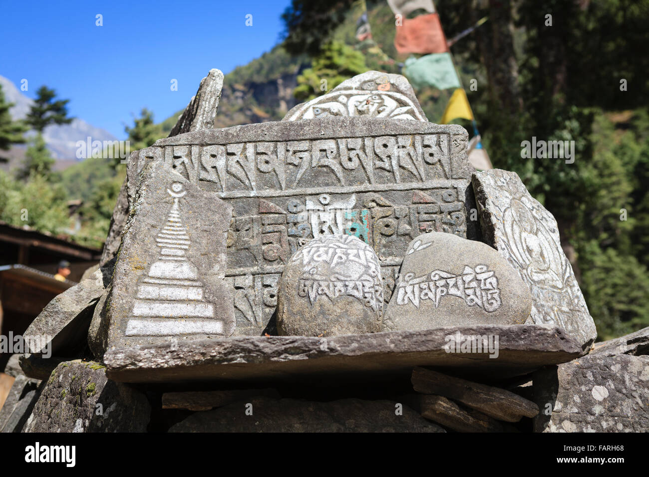 Mani Stones on the Everest trail. Sagarmatha National Park. Solukhumbu District. Nepal. Stock Photo