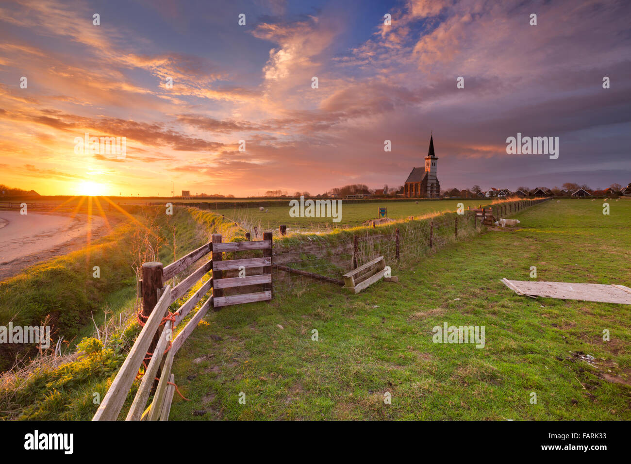 The church of Den Hoorn on the island of Texel in The Netherlands at sunrise. Stock Photo
