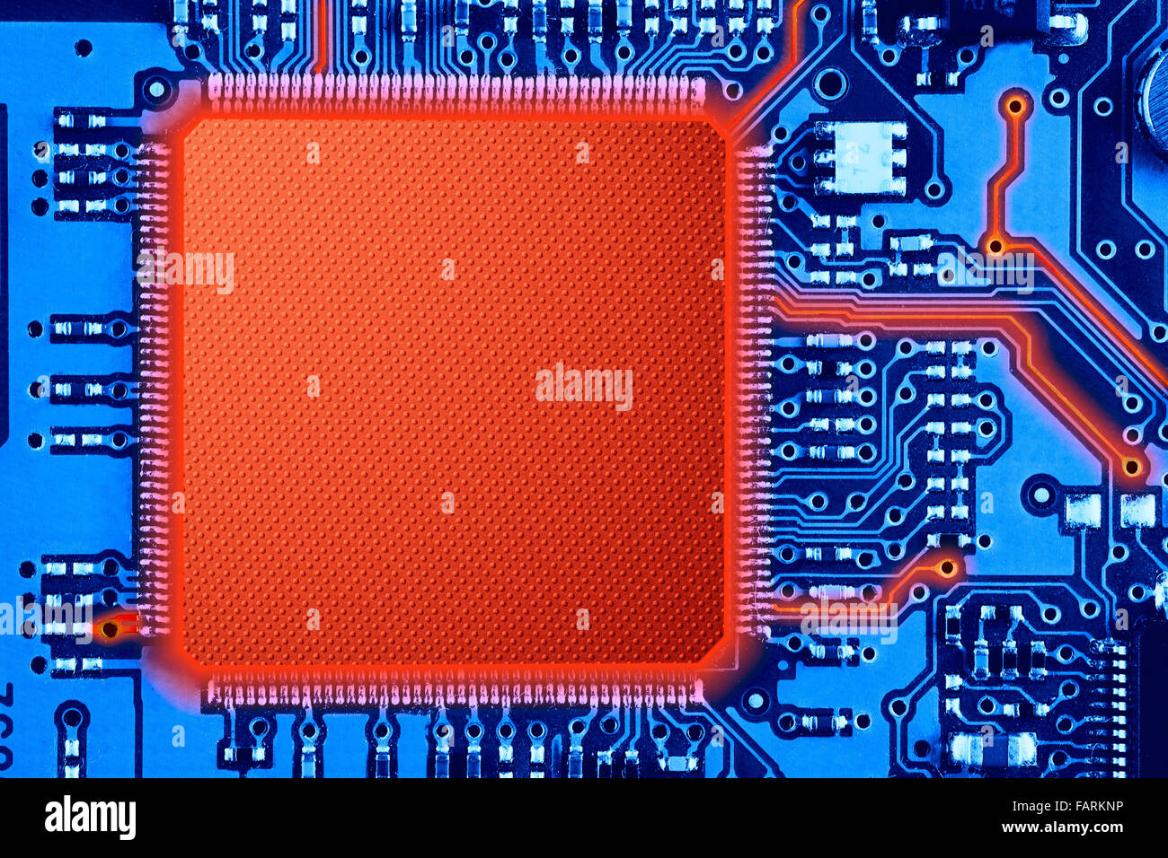 blue and red printed circuit board or computer technology background Stock Photo