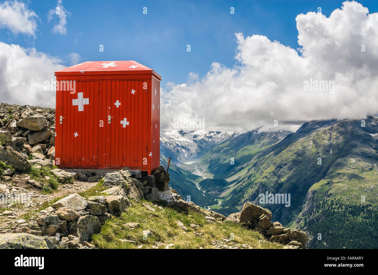 Outhouse in Swiss national colours at Segantin Hut, Engadine, Grisons, Switzerland Stock Photo