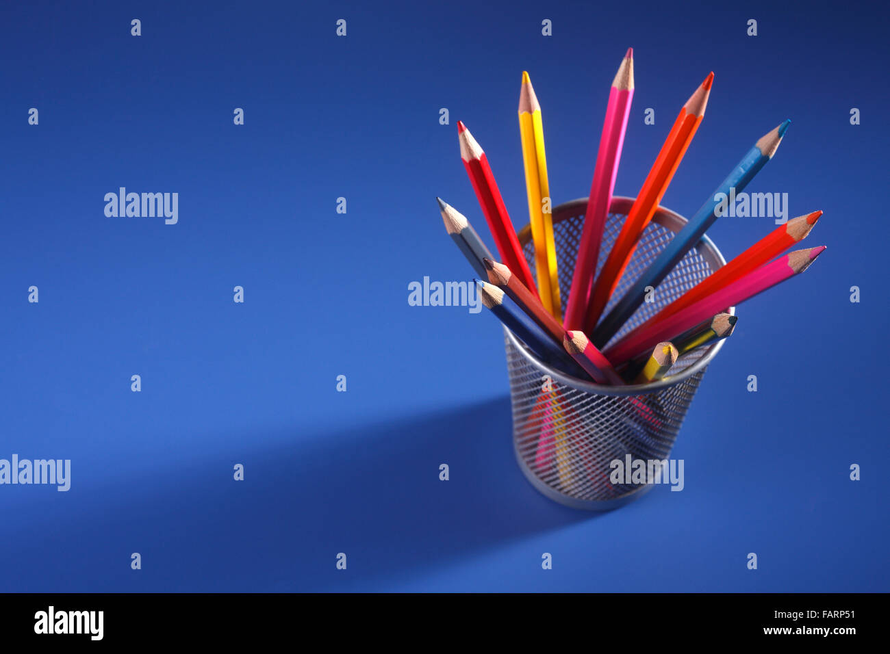 group of the color pencil on the blue background Stock Photo