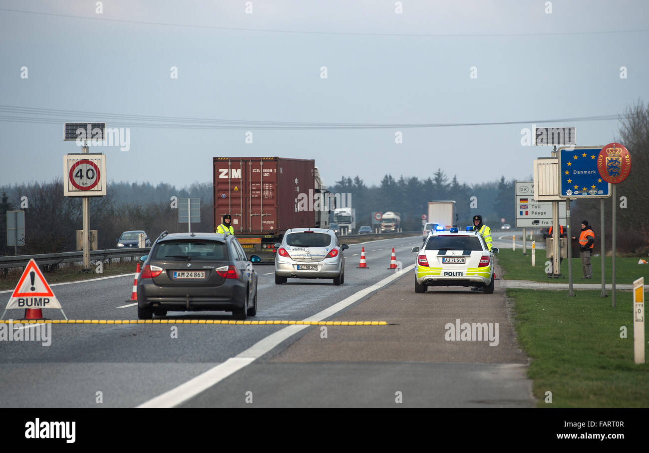 Flensburg, Germany. 04th Jan, 2016. Danish policemen patrol the German