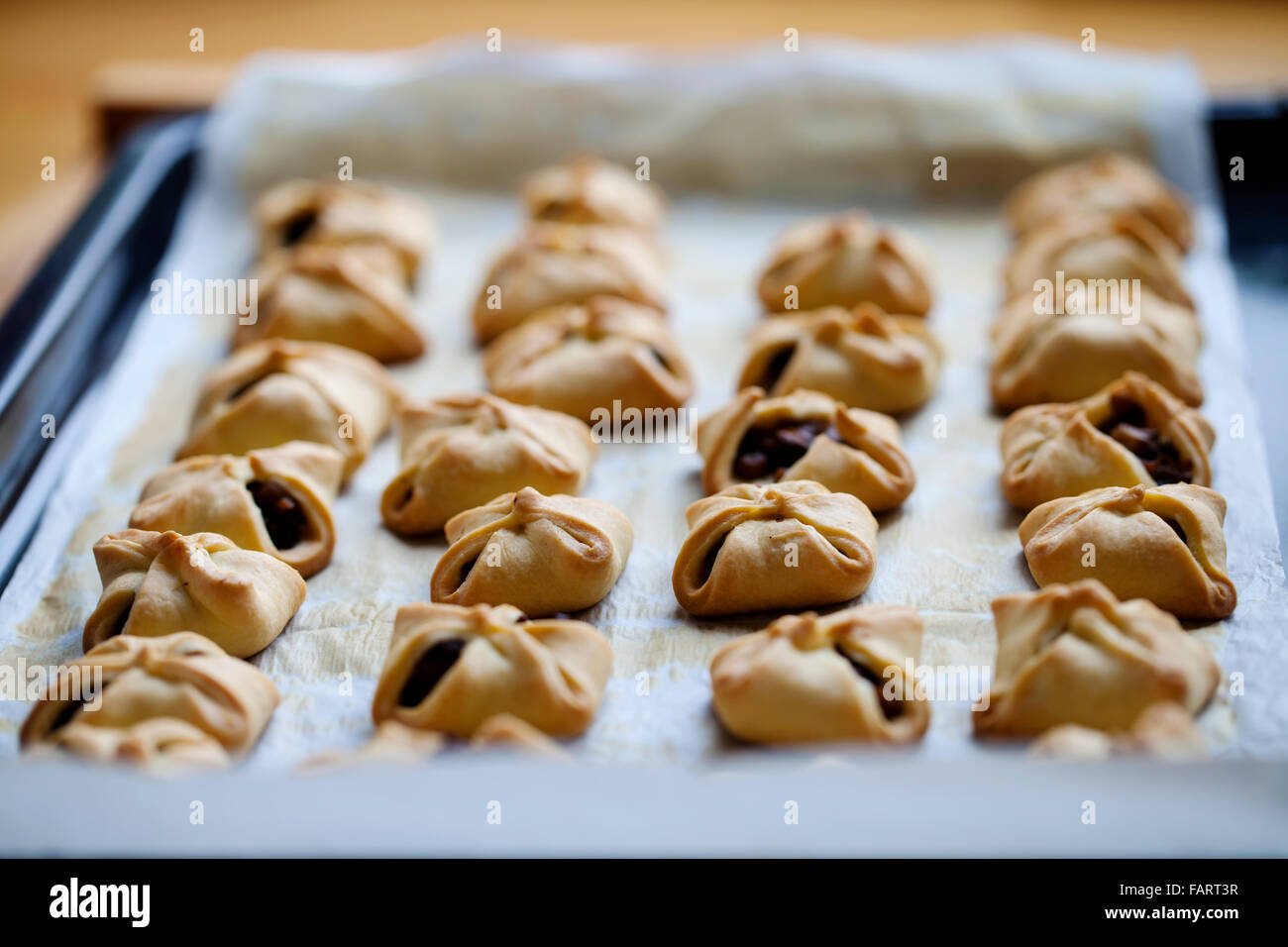 Pastry parcels with mushrooms Stock Photo
