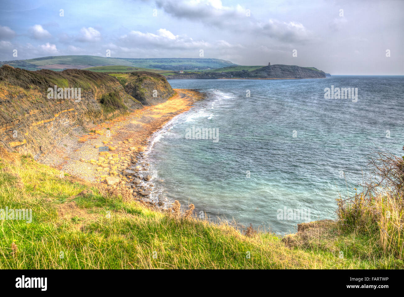 Kimmeridge Bay east of Lulworth Cove on the Dorset coast England uk in colourful HDR towards Clavell Tower Stock Photo