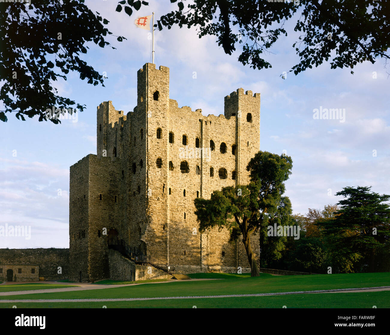 ROCHESTER CASTLE, Kent. Castle through the trees from inside the inner bailey Stock Photo