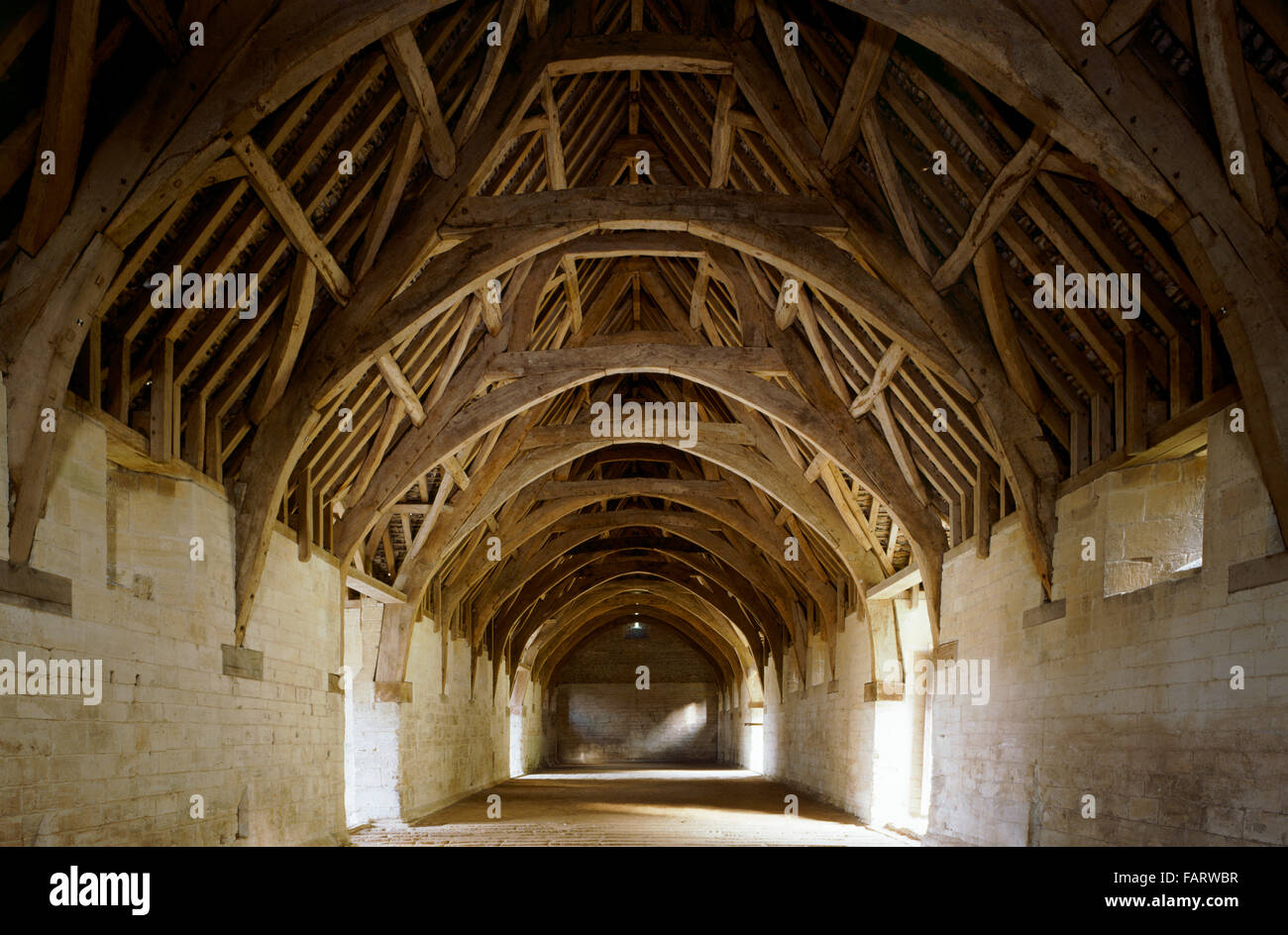 BRADFORDONAVON TITHE BARN, Wiltshire. Interior view. Beamed arched