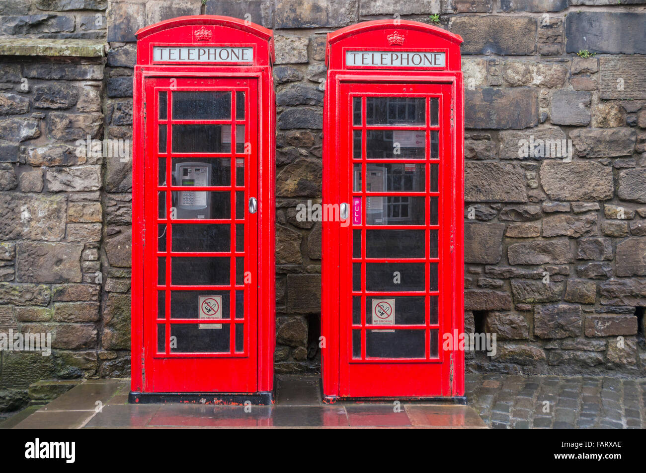 two traditional red telephone boxes red phone box uk Stock Photo