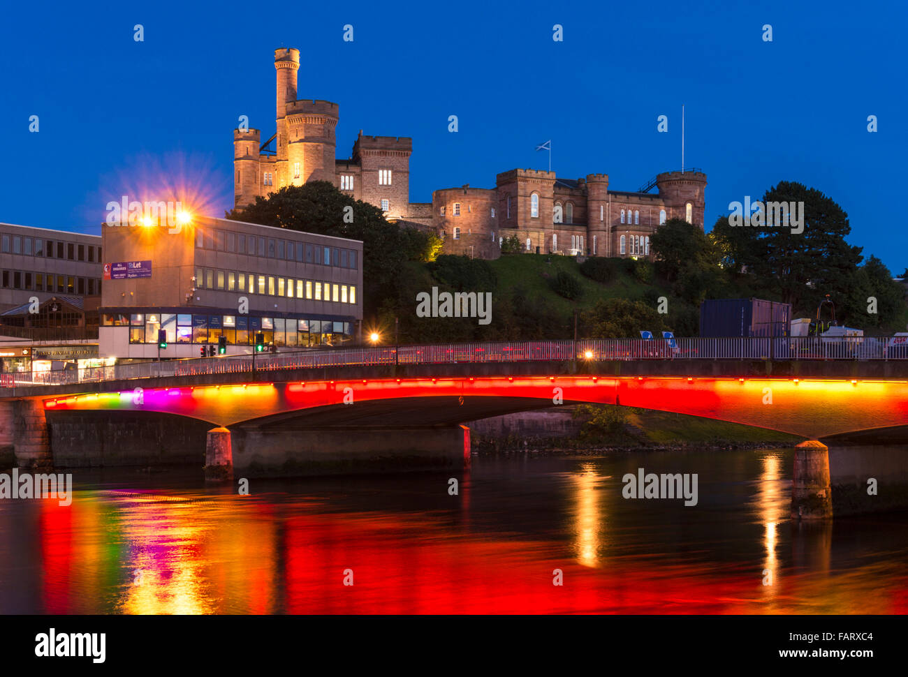 Inverness castle illuminated at night from Huntly street on the banks of the River Ness Highlands of Scotland EU UK GB Europe Stock Photo