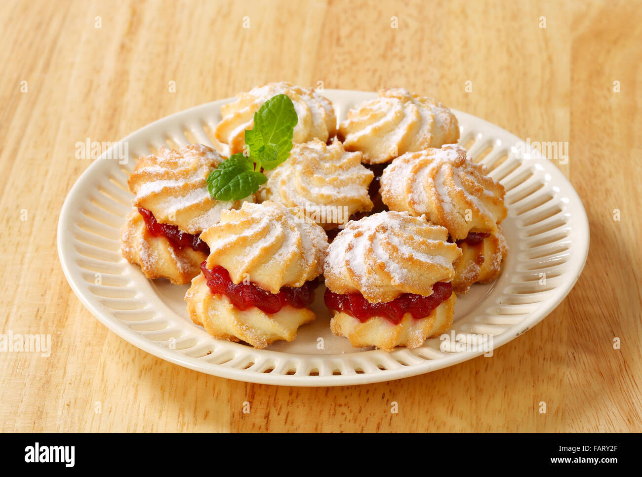 Jam sandwich cookies powdered with icing sugar Stock Photo Alamy