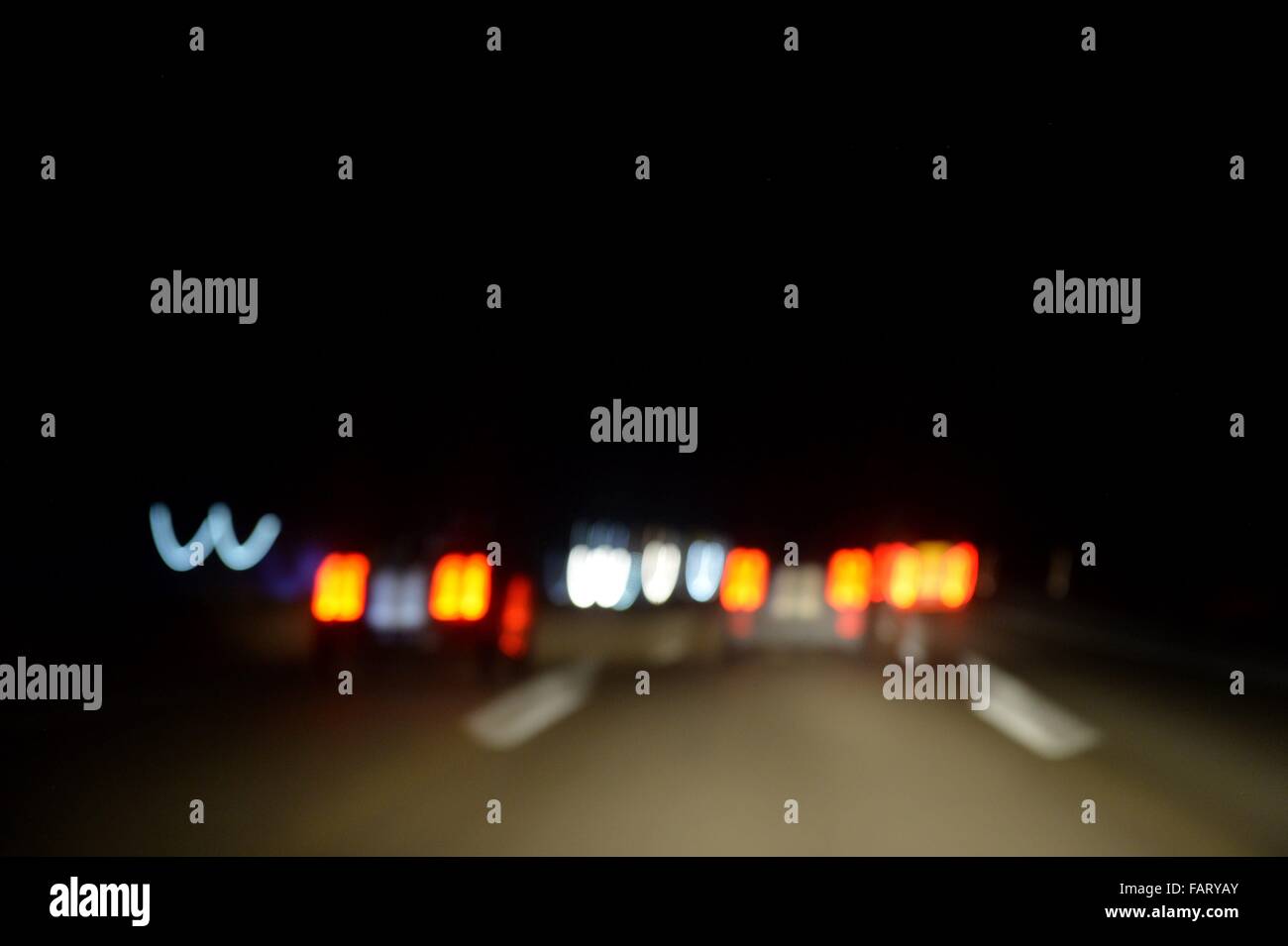 Cars on a german Highway at night, Germany, 16. December 2015. Photo: Frank May Stock Photo